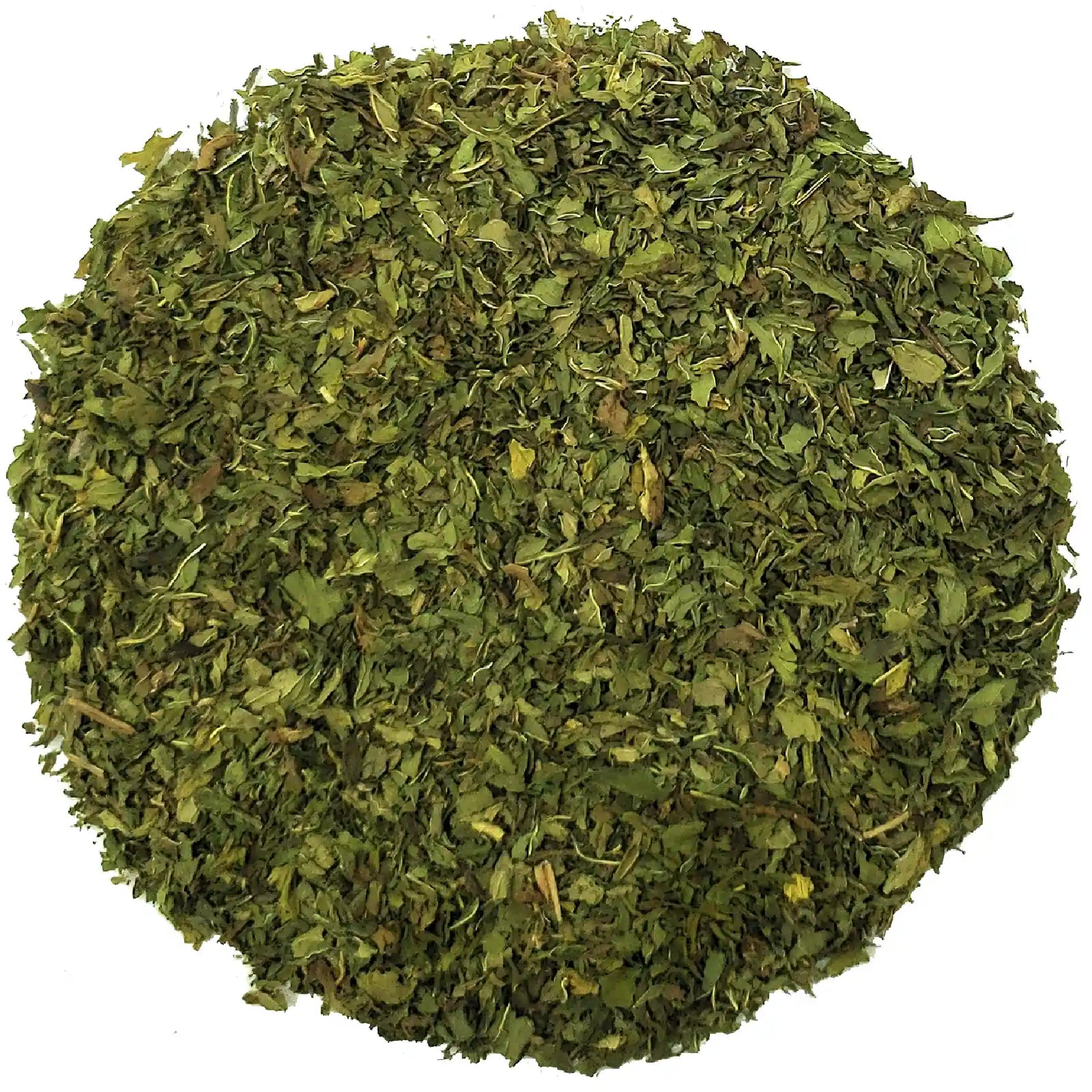 Pile of green dried herbs on a white background